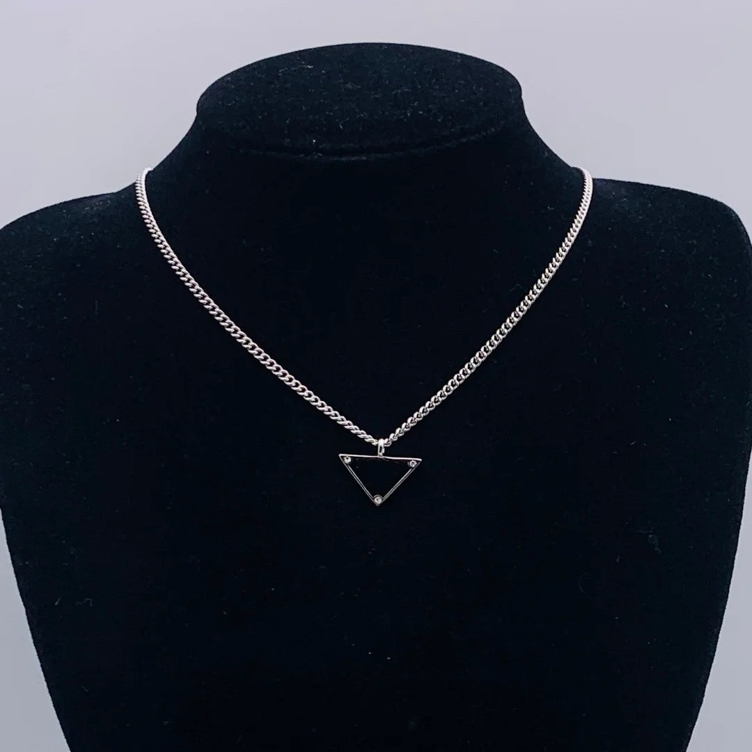 Rhinestone Triangle Pendant with Tassel Silver Tone